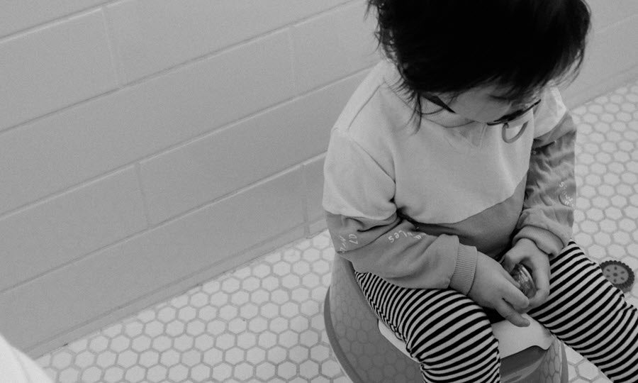 How to Potty Train Your Child while Going from Crib to a Big Kid Bed